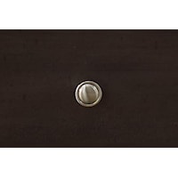 Simple Round Knobs in a Silver Finish Color are Appointed on Drawers and Doors